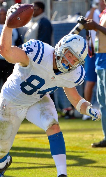 Doyle's late TD vaults Colts over Titans, 34-26
